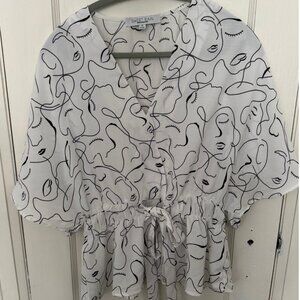 Front tie blouse with abstract faces